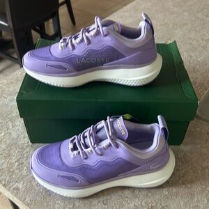 Women’s Lacoste sneaker is size 5.5
